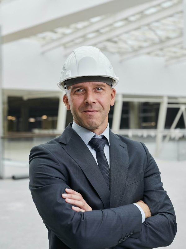 confident-businessman-at-construction-site-1.jpg